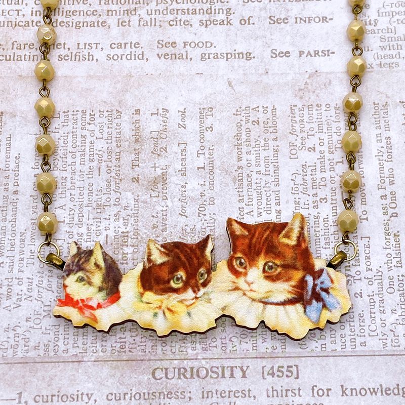 wood necklace (frilly cats)