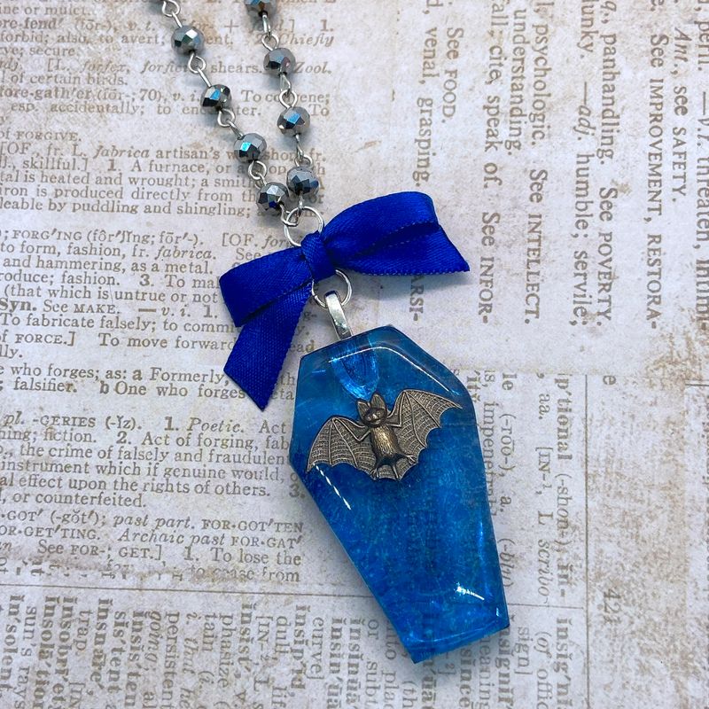celestial bat coffin necklace