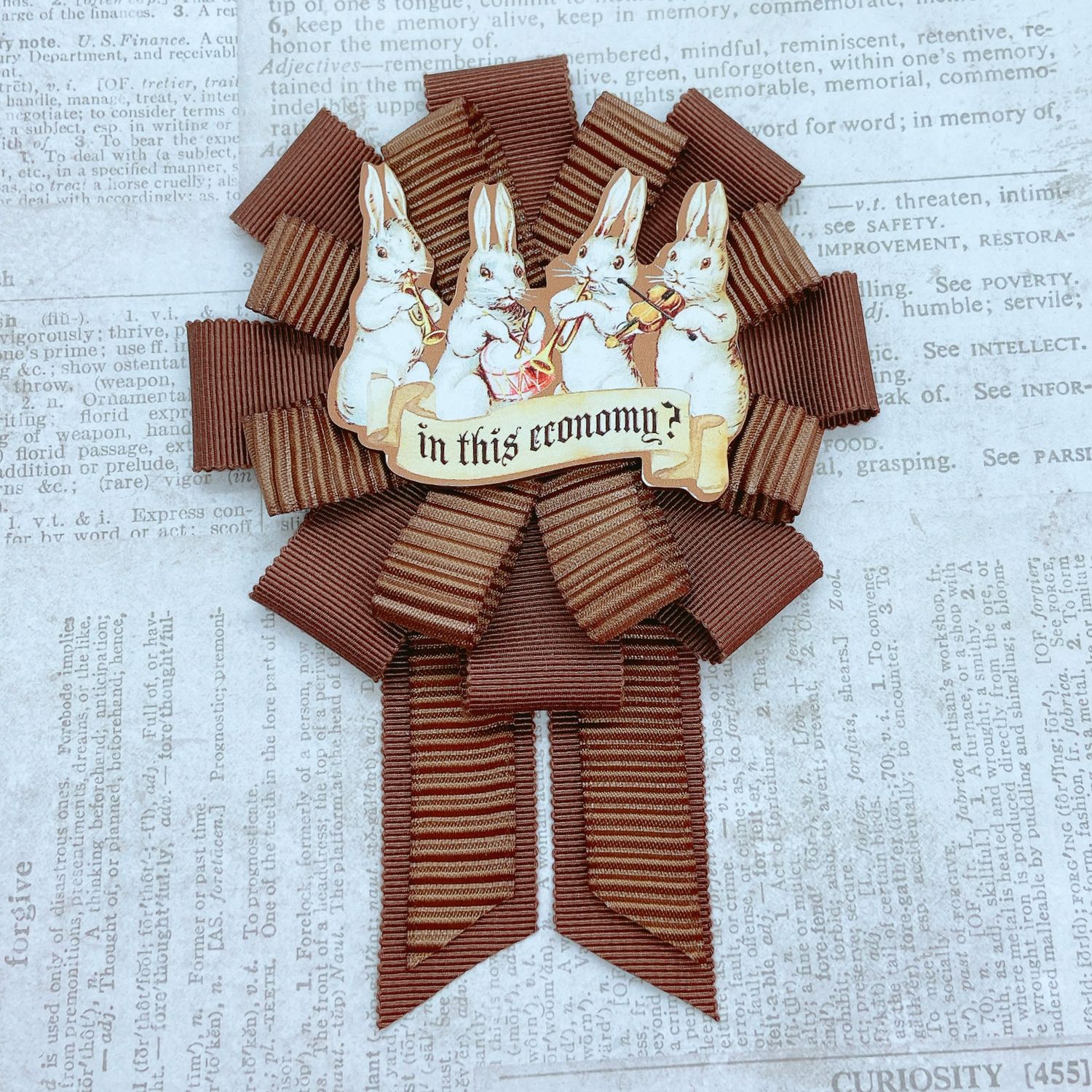 "in this economy" rosette (brown)