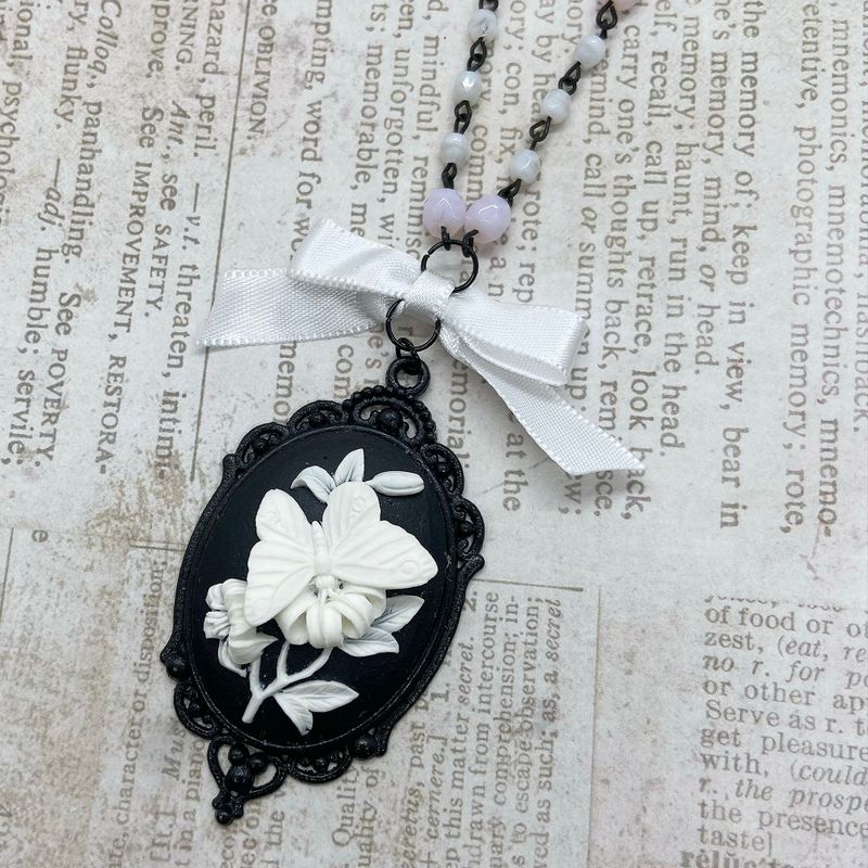 cameo necklace (butterfly and flowers)