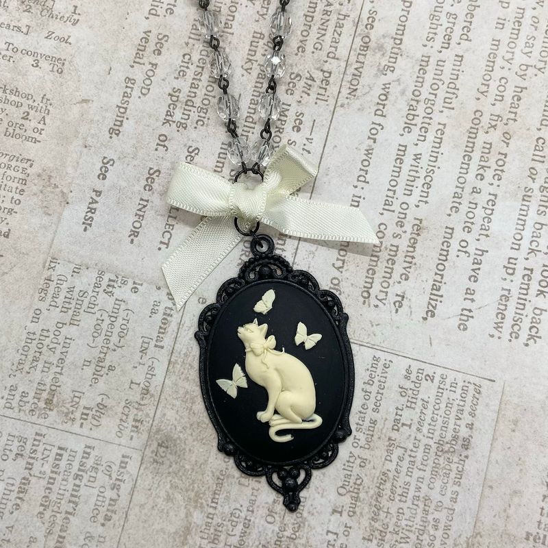 cameo necklace (cat and butterflies)