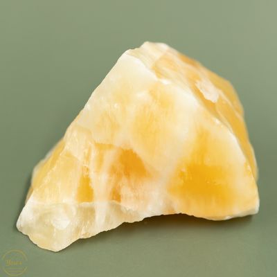 Gele/oranje calciet ruw - 191 gram