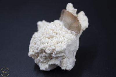 Goud topaas op clevelandiet - 108 gram