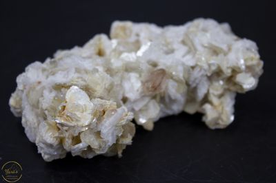 Goud topaas op clevelandiet met mica - 118 gram