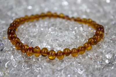 Barnsteen armband rond egaal