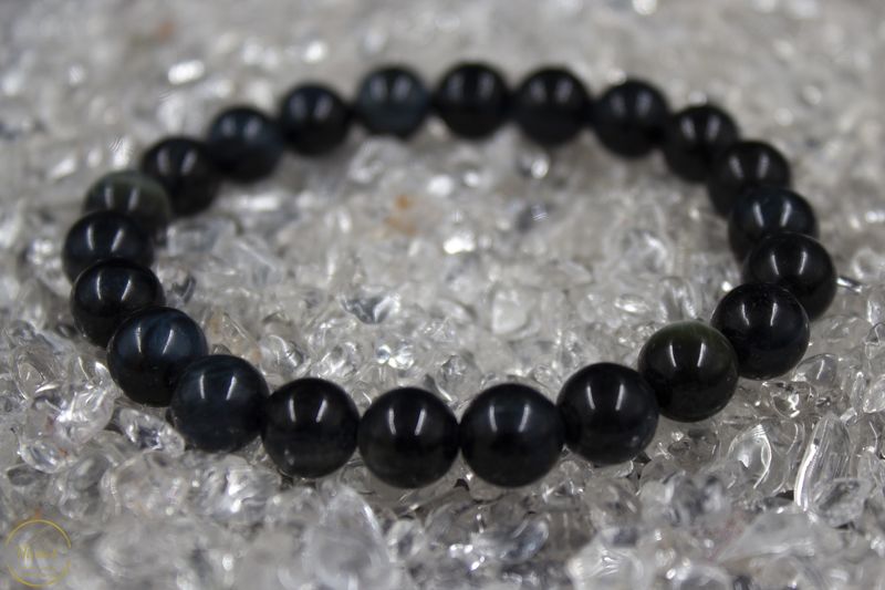 Valkenoog / blauwe tijgeroog armband 8mm