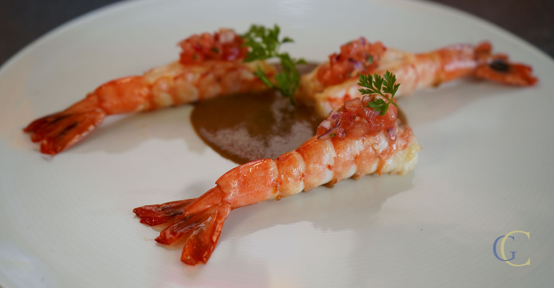 Carry de Cameron Zembrocal, bisque créole, rougail tomate