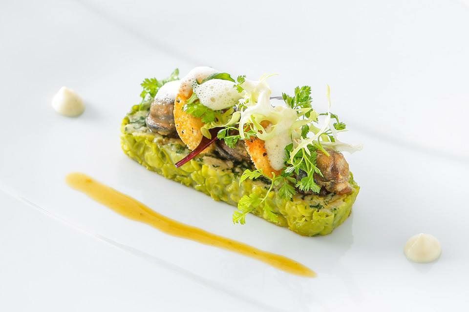 Farci Charentais aux herbes dans la tradition, cagouilles et lard fumé Farci Charentais aux herbes dans la tradition, cagouilles et lard fumé