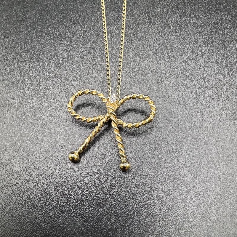 14K ROPE BOW PENDANT ON ROLO CHAIN 18&quot;