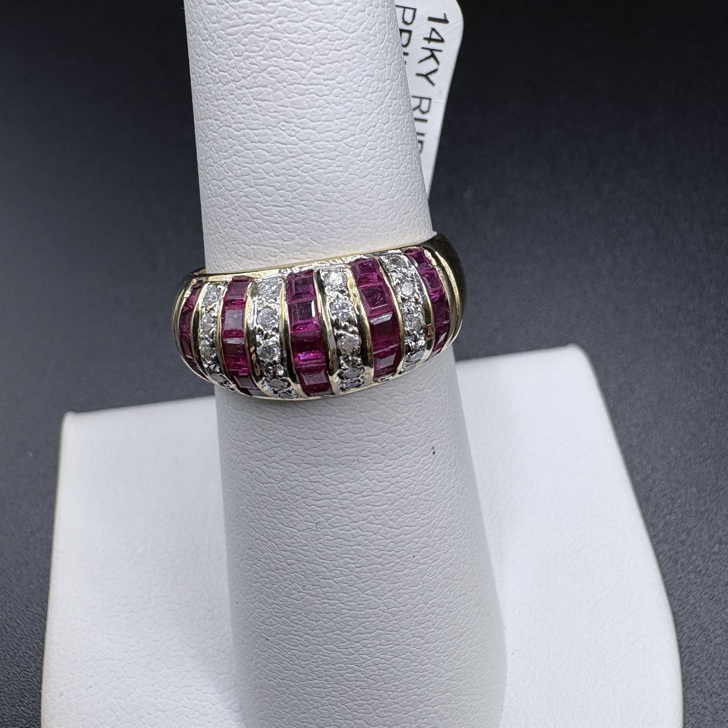 14K RUBY AND DIAMOND CHANNEL SET BAND SIZE 6.5