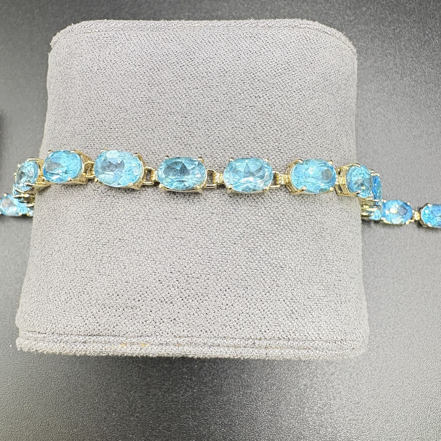 14K BLUE TOPAZ OVAL BRACLET, 7 INCHES, 10.3G