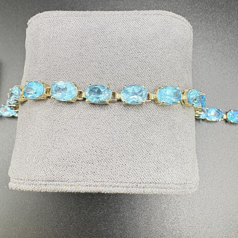 14K BLUE TOPAZ OVAL BRACLET, 7 INCHES, 10.3G