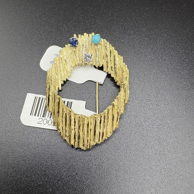 18k vintage abstract, or brutalist- style brooch, oval shape, textured Florentine  finish, featuring sapphire, diamond, and turquoise stone, 12.95 grams