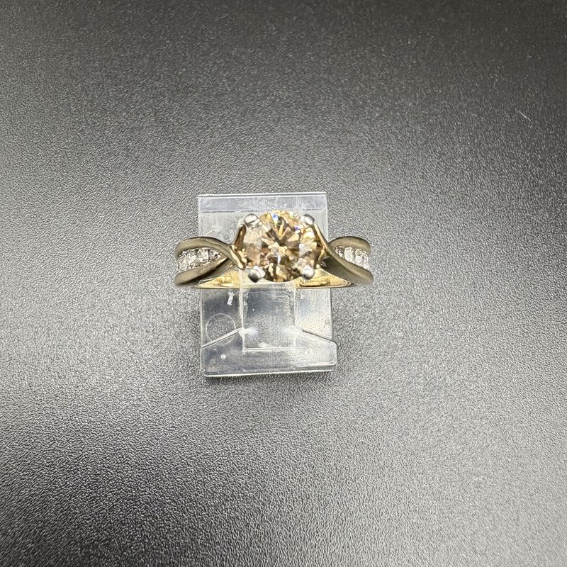 14k channel set round brown diamond engagement ring with a 4 prong set round brilliant brown diamon in platinum peg style head, size 6, 4.6g