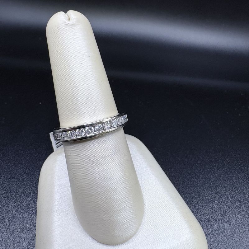 14K NATURAL DIAMOND CHANNEL SET BAND, APROX 0.72CTW, SIZE 7, 3.1G