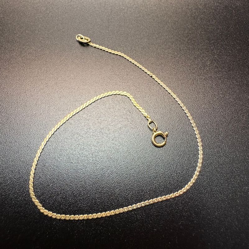 14 K GOLD 8" SERPANTINE BRACELET