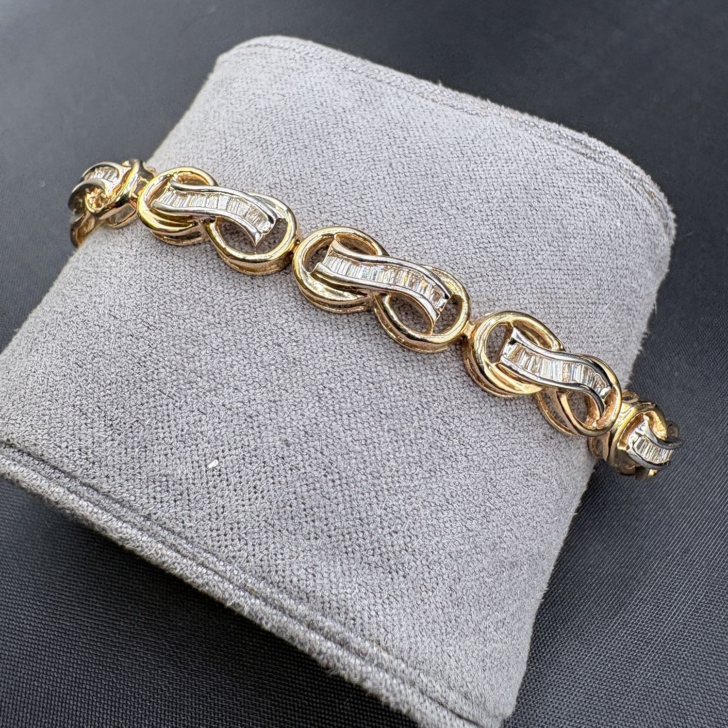 14KY INFINITY DESIGNED BAGUETTE NATURAL DIAMOND BRACELET, 7 INCHES, APPROX 2.2CTW,15.3GRAMS