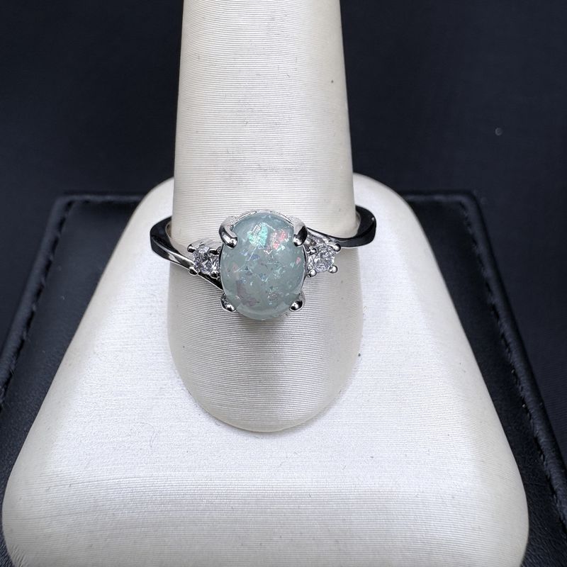 STERLING SILVER OPAL- LIGHT GREEN OVAL SIZE 9 3/4, 2.3GRAMS
