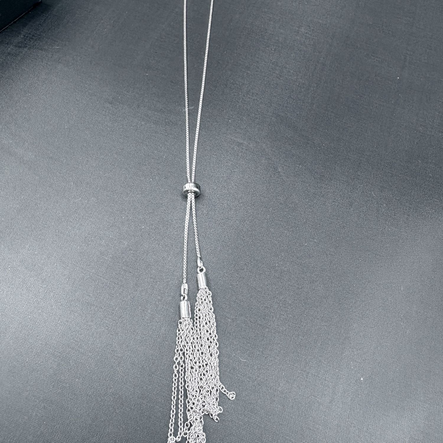 SLIVER TONE BOLO NECKLACE WITH FRINGE