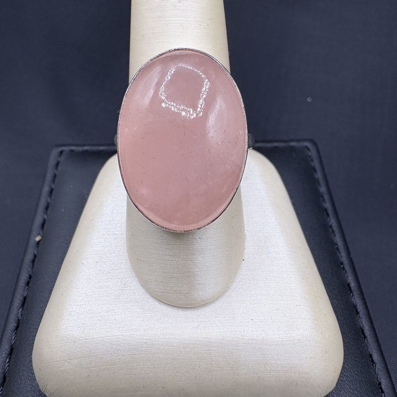 SS ROSE QUARTZ 24 X 18MM CAB. BEZEL SET, SIZE 8.5, 9.3 GRAMS