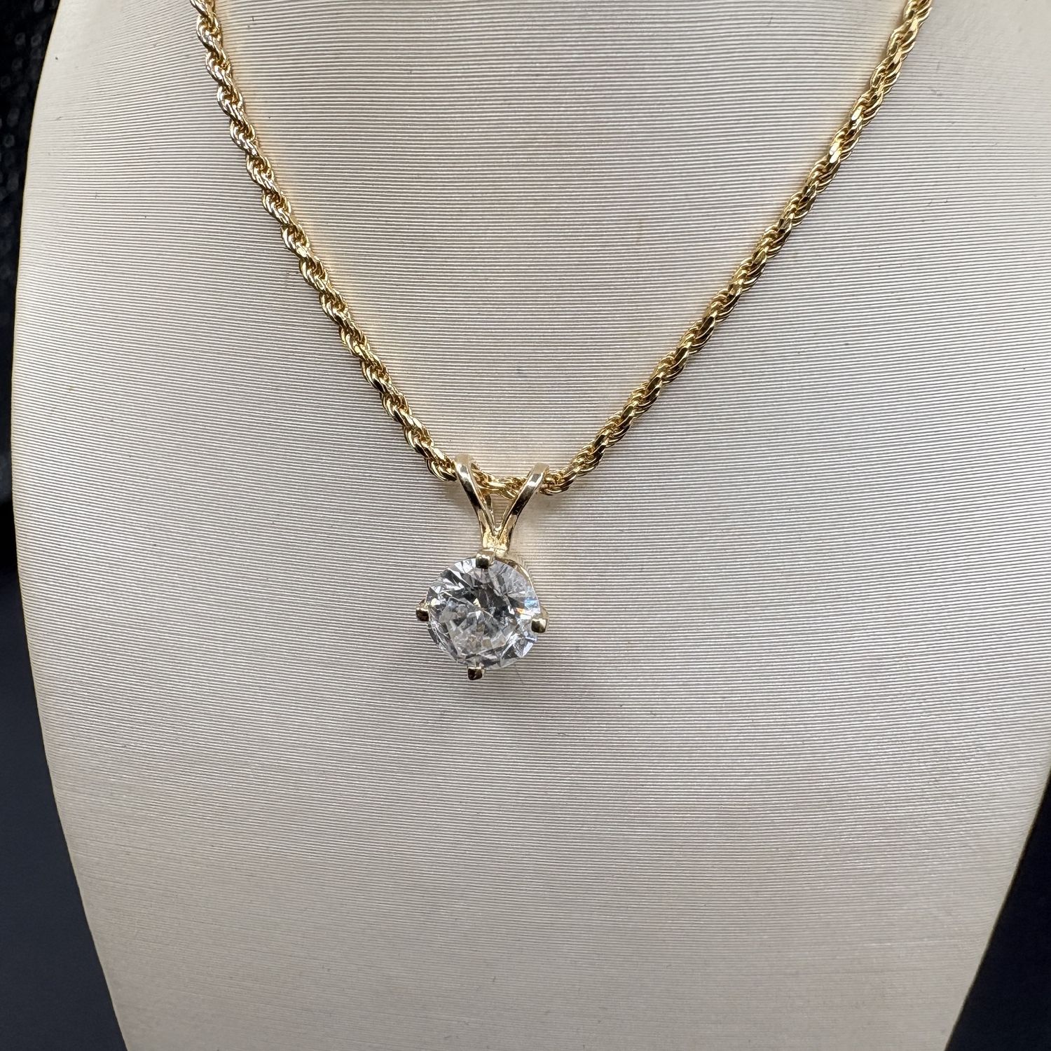 14K DIAMOND 4 PRONG PENDANT ON 24" ROPE CHAIN