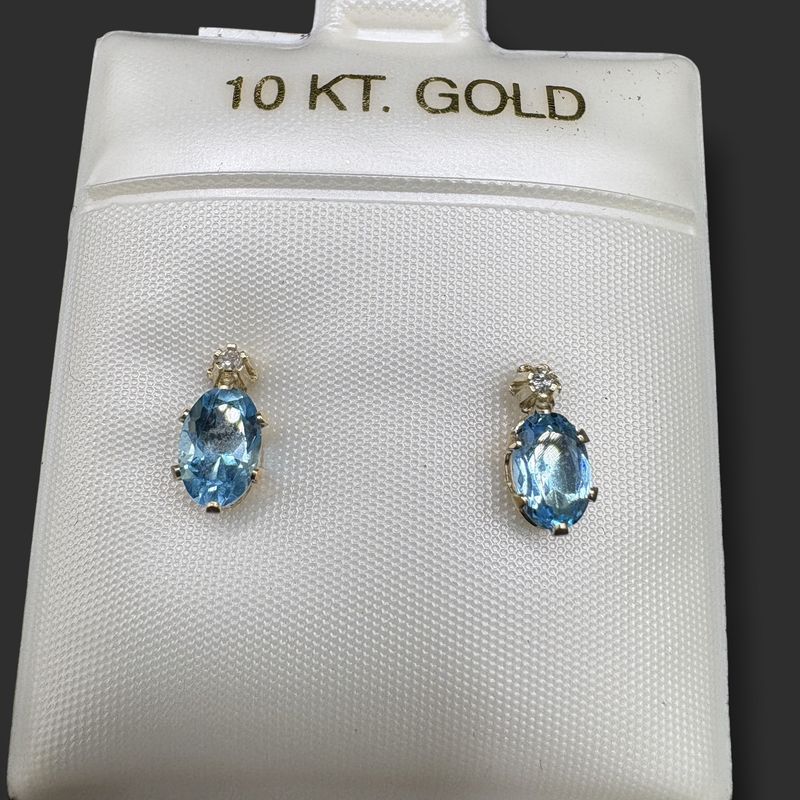 10K BLUE TOPAZ OVAL STUD WITH SMALL DIAMOND