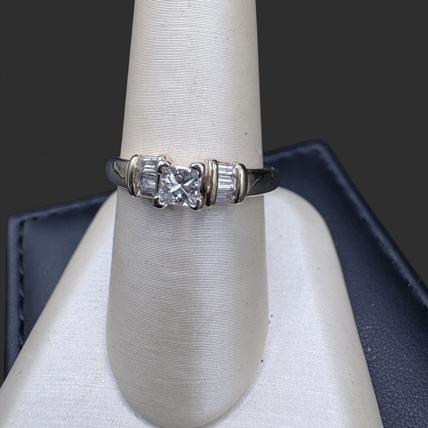 14KY ENGAGMENT RING, 3.6MM PRINCESS NATURAL DIAMOND APPROX .30CT, 6 BAGUETTES, APPROX 0.66TCW, I-J COLOR, SI1 CLARITY, SIZE 7 3/4 2.6 GRAMS