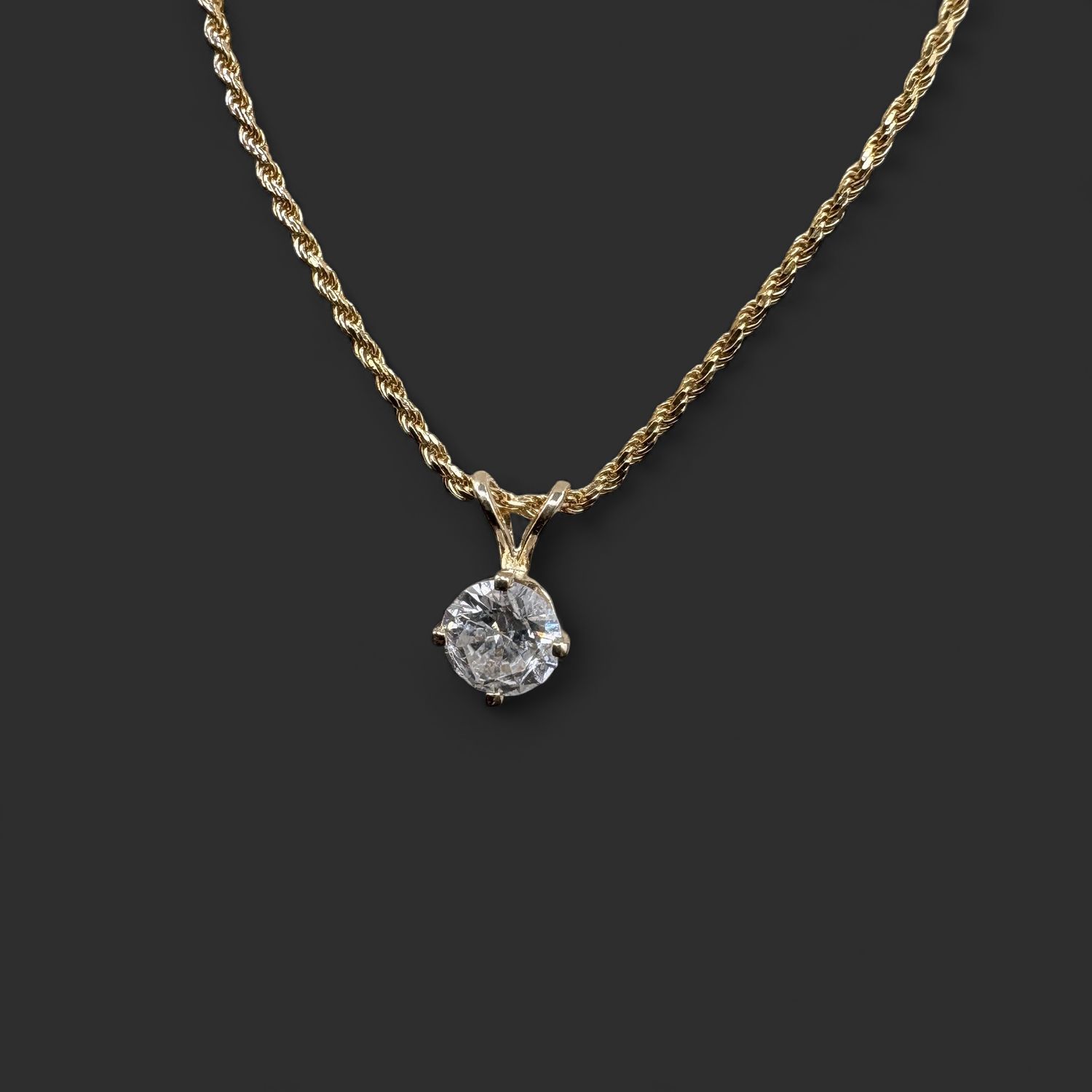 14K DIAMOND 4 PRONG PENDANT ON 24" ROPE CHAIN