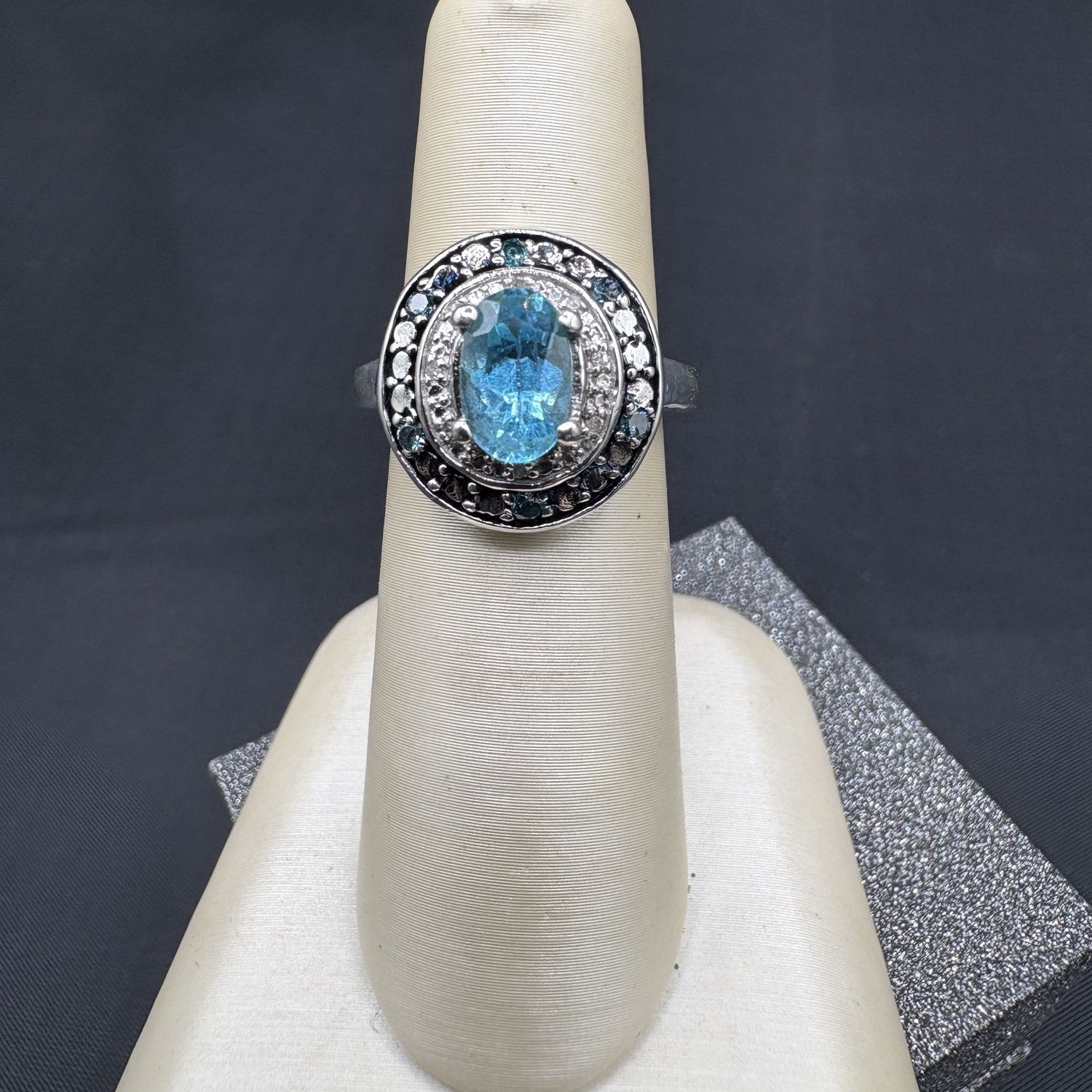 STERLING BLUIE TOPAZ AND CZ HALO RING SIZE 5
