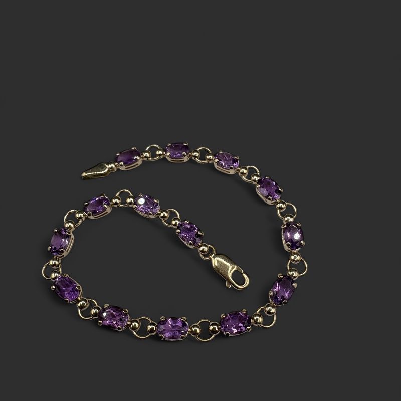 10K OVAL AMETHYST TENNIS BRACELET 7"