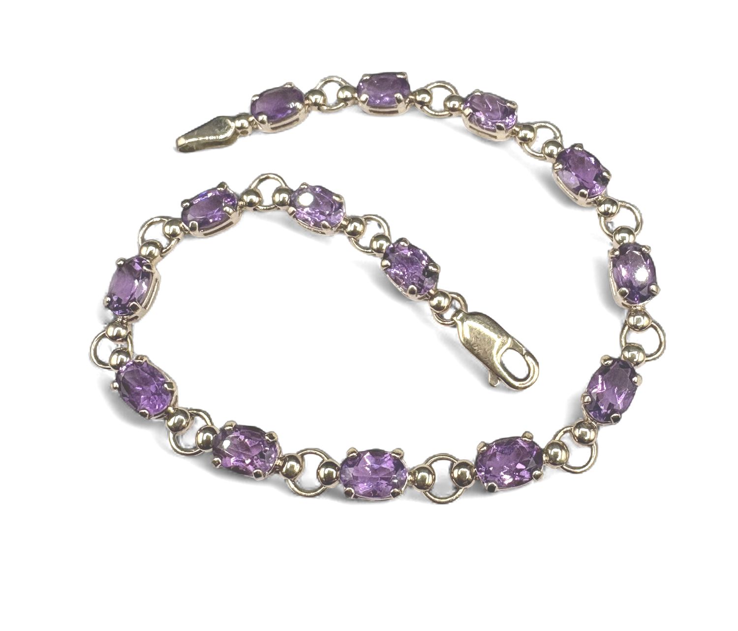 10K OVAL AMETHYST TENNIS BRACELET 7"