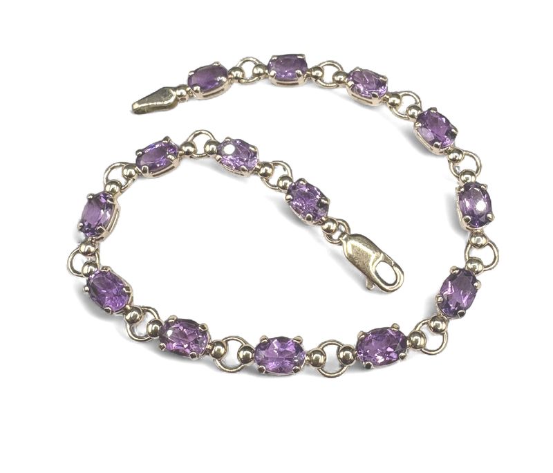 10K OVAL AMETHYST TENNIS BRACELET 7"
