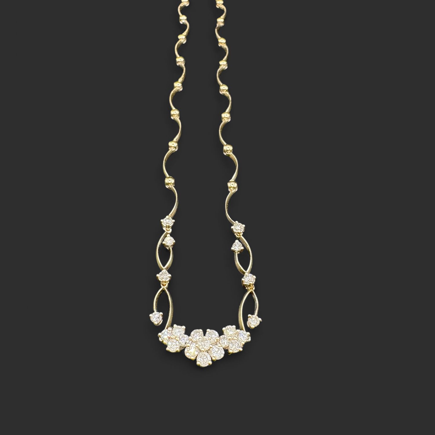 14K CURVED HINGED DIAMOND NECKLACE /YELLOW GOLD 16"