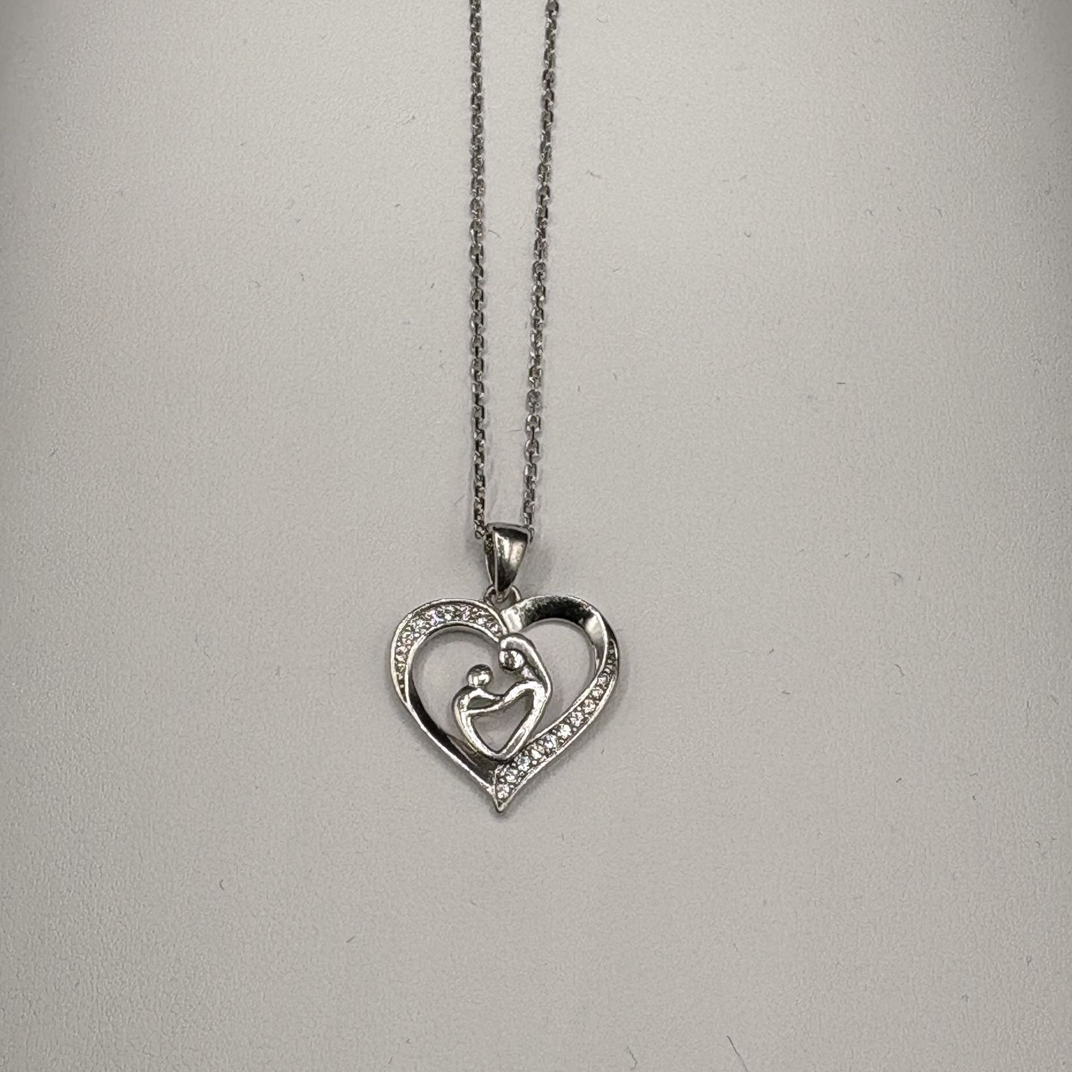 STERLING MOTHER AND CHILD HEART PENDANT AND 18" CHAIN