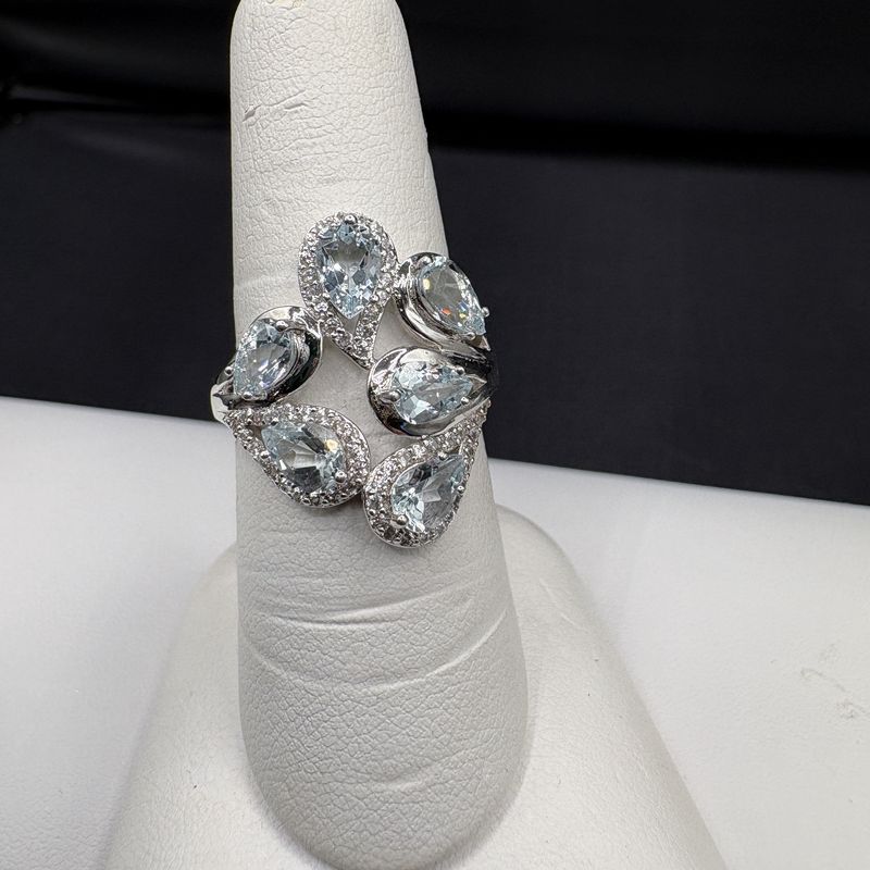 STERLING BLUE TOPAZ WITH CZ RING SIZE 7