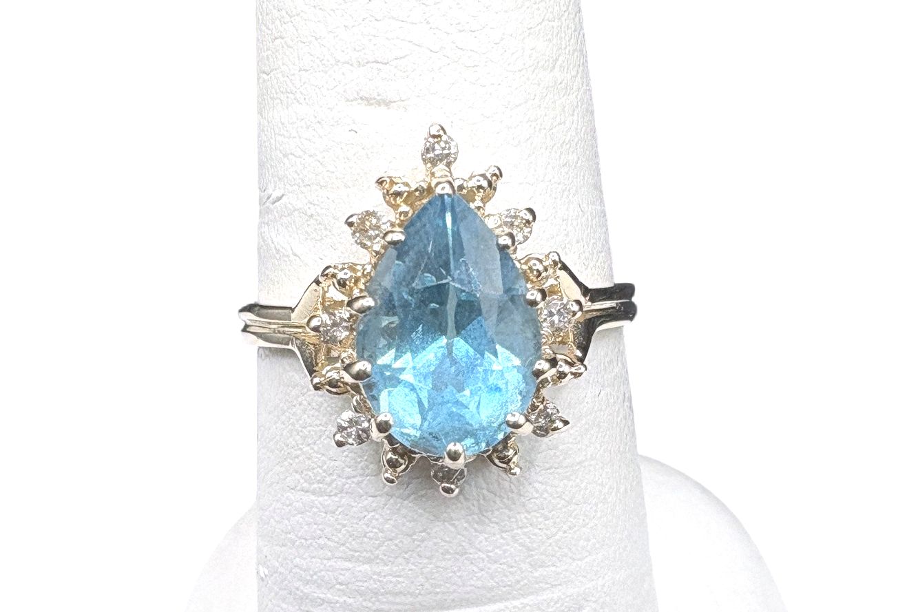 14K SWISS BLUE TOPAZ WITH DIAMOND HALO RING SIZE 7.25