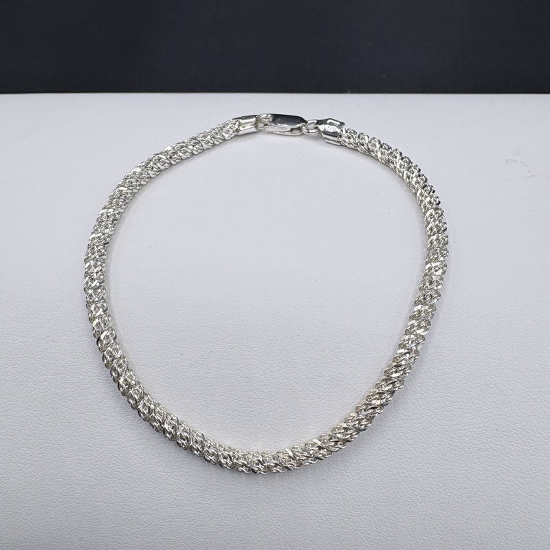 STERLING DIAMOND CUT TWISTED BRACELET 7"