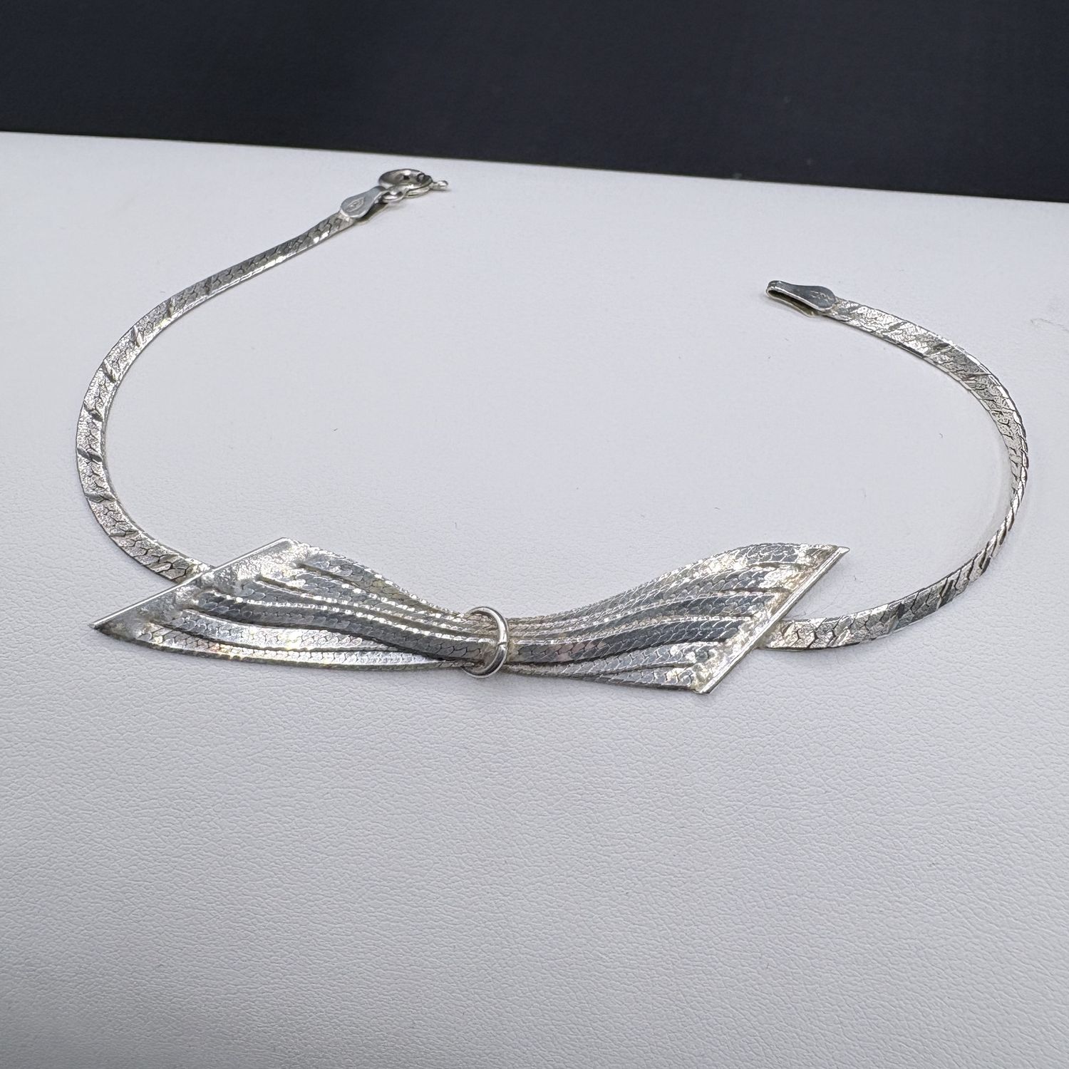 STERLING BOW HERRING BONE BRACELET 7"