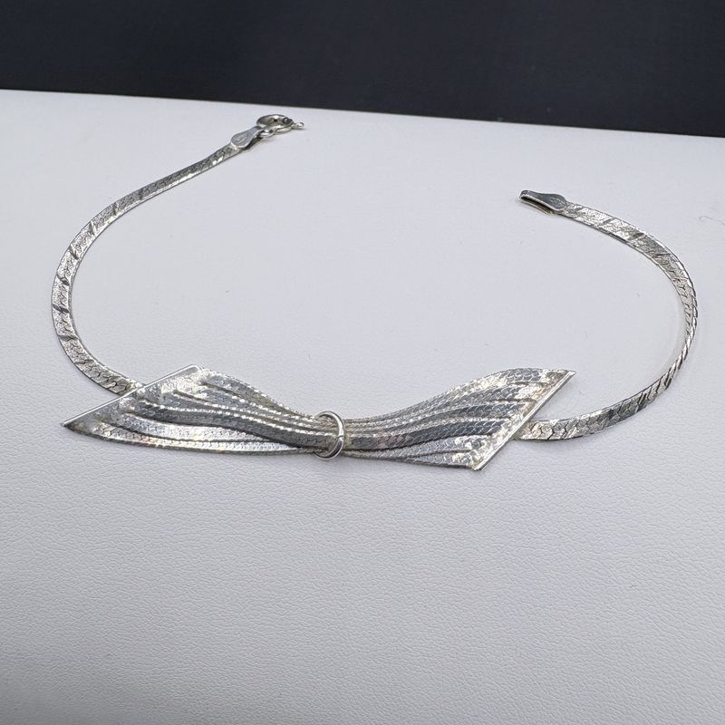 STERLING BOW HERRING BONE BRACELET 7"