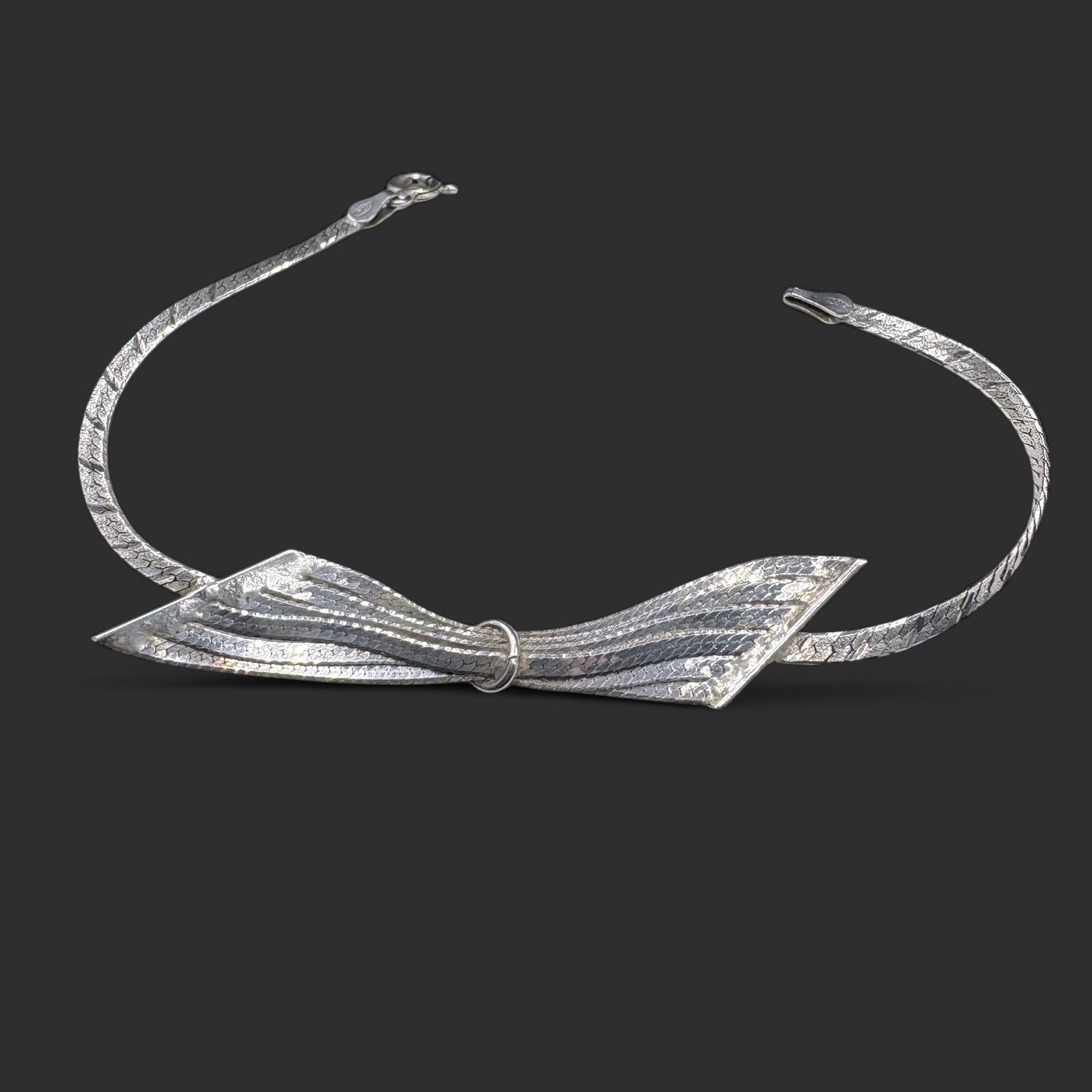 STERLING BOW HERRING BONE BRACELET 7"