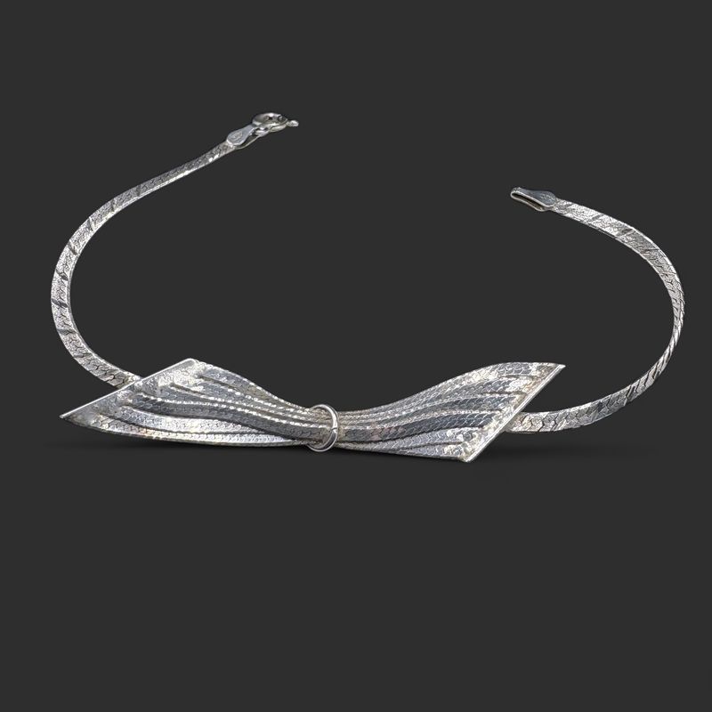 STERLING BOW HERRING BONE BRACELET 7"