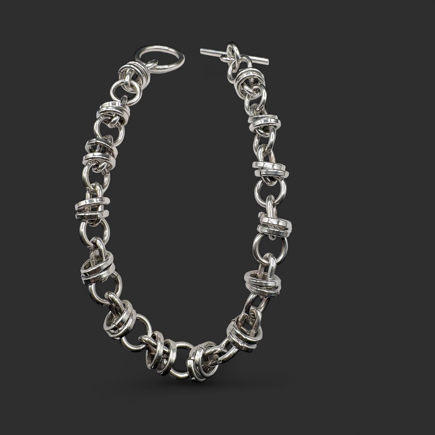 STERLING MULTI RING BRACELET 7.25"