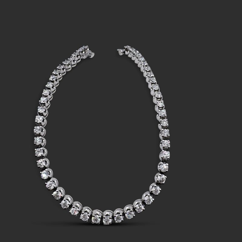 STERLING ROUND CZ TENNIS BRACELET 7"