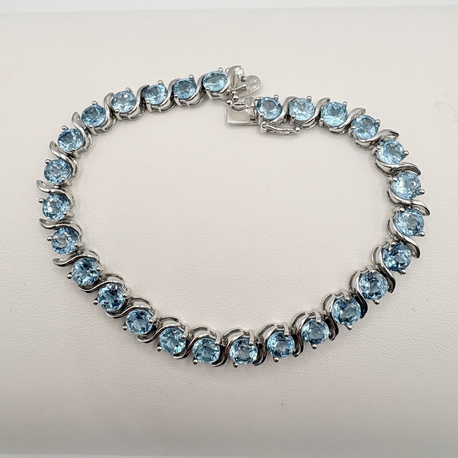 STERLING BLUE TOPAZ TENNIS BRACELET 8"