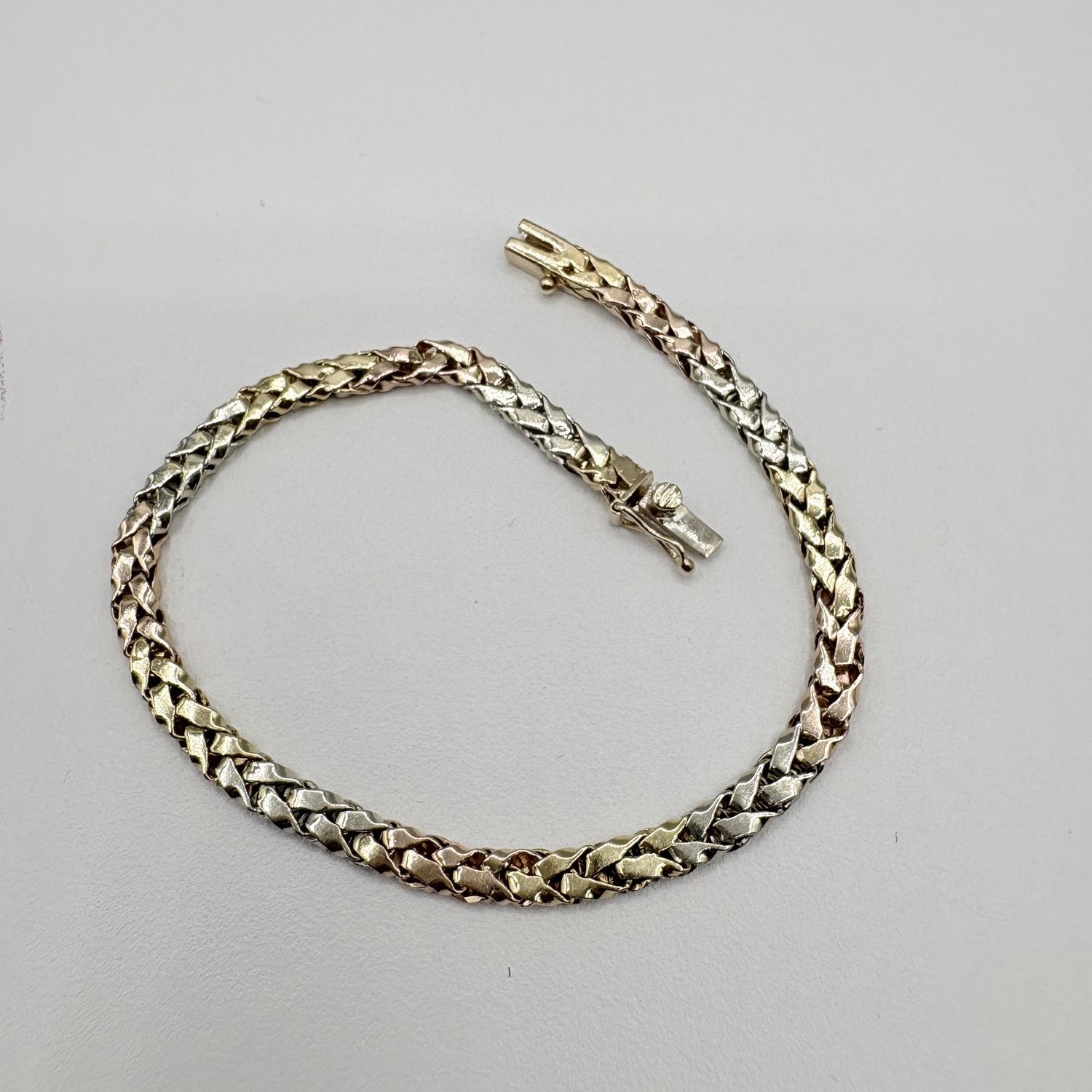 14K TRI GOLD BRAIDED BRACELET 7.5"