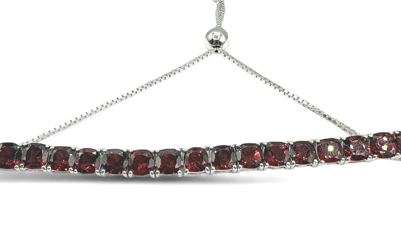 STERLING BOLO GARNET BRACELET