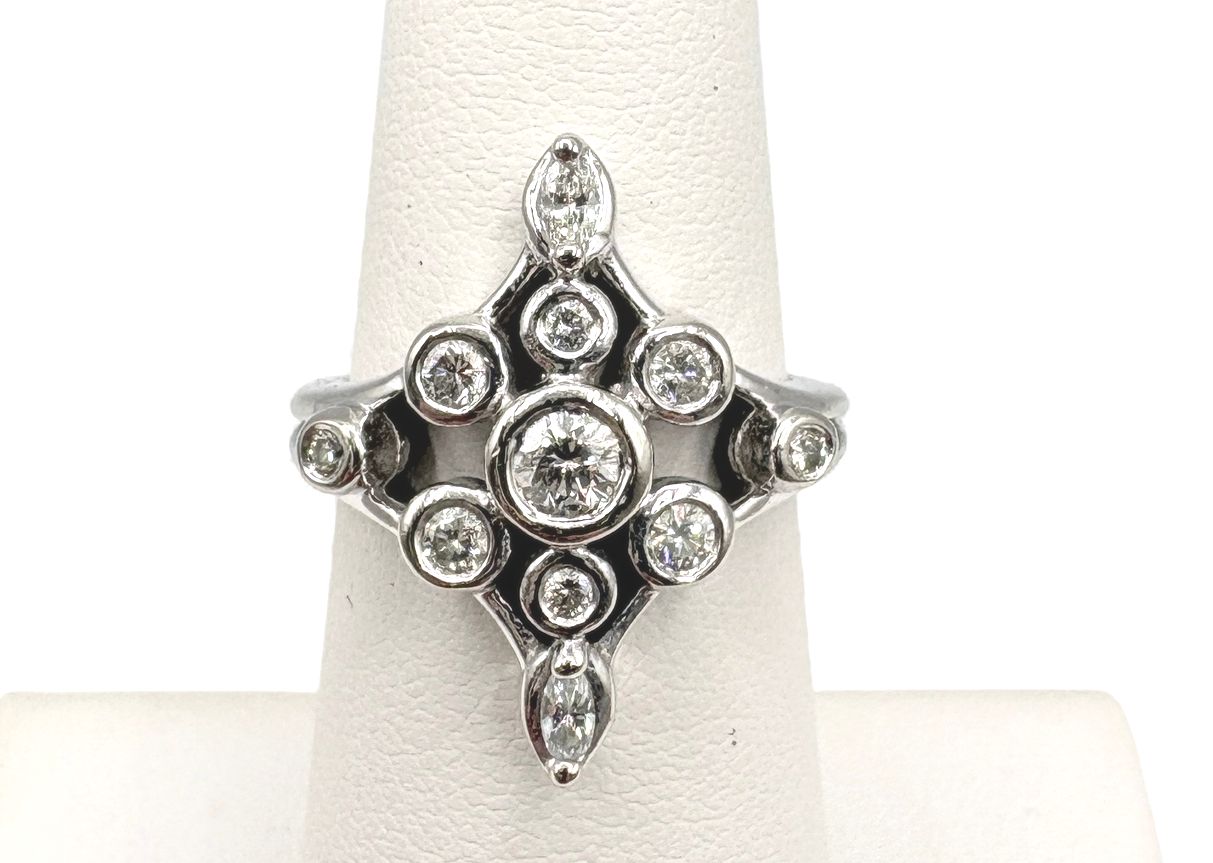 14K BEZEL APPROX  .6CTW DIAMOND WHITE GOLD RING SIZE 6