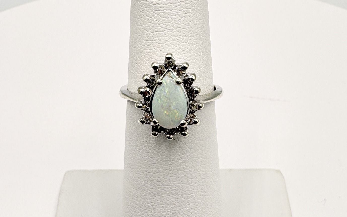 14KW OPAL WITH DIAMOND HALO RING SIZE 4.25