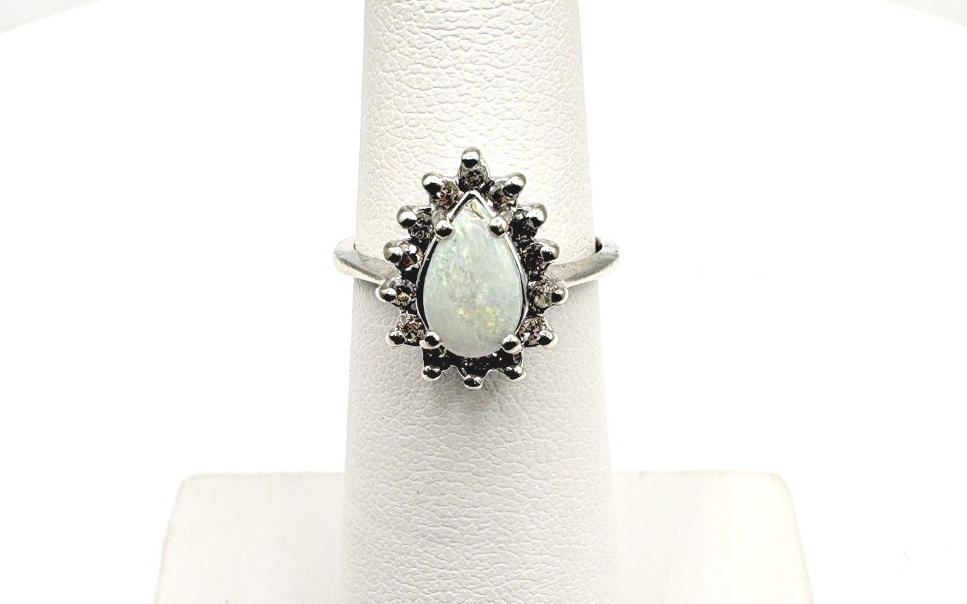 14KW OPAL WITH DIAMOND HALO RING SIZE 4.25