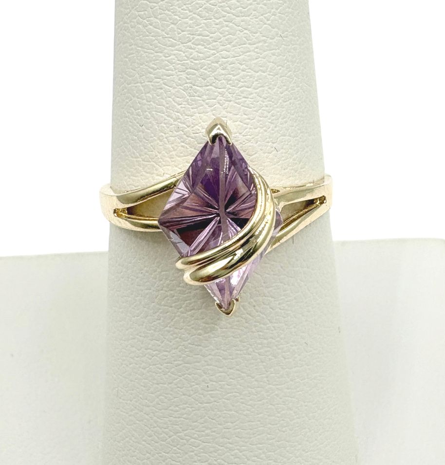 10KY AMETHYST WITH CROSSOVER RING SIZE 7